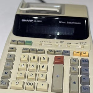 Calculadora portátil Sharp EL-1801V de 12 dígitos y 2 colores con impresión en serie. Funcionamiento comprobado.
