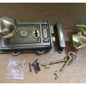 Cast Iron Davenport Rim Lock Antique Brass & Octagonal Rim Knob Polished Brass