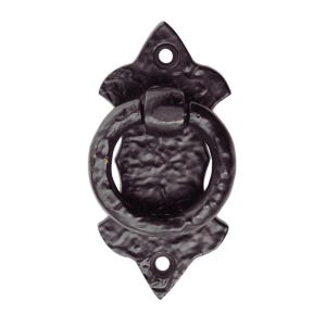 May include: A dark bronze-colored door knocker with a hammered texture. The knocker features a round ring attached to a decorative backplate with a diamond-shaped top and bottom. Two holes are visible for mounting.