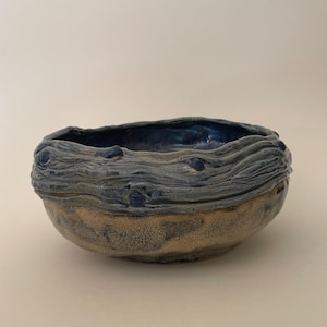 Vintage handmade blue pottery bowl