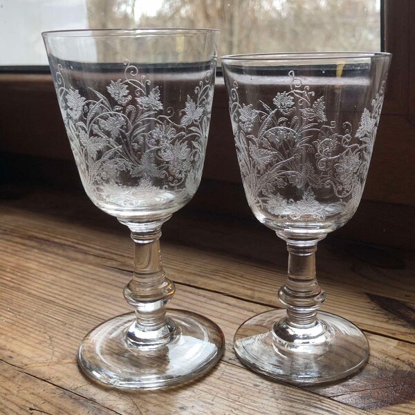 Two antique Baccarat wine glasses