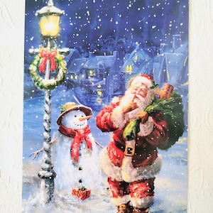 Carte de Noël du Père Noël - Bonhomme de neige du Père Noël avec des cadeaux de Noël - Cartes postales de voeux de joyeux Noël