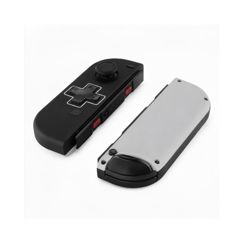 Pode incluir: Um controlador de jogo preto e cinza com um D-pad, bot&otilde;es e um joystick. O controlador tem um design retr&ocirc; com bot&otilde;es vermelhos e uma parte traseira cinza. O controlador &eacute; projetado para jogos.