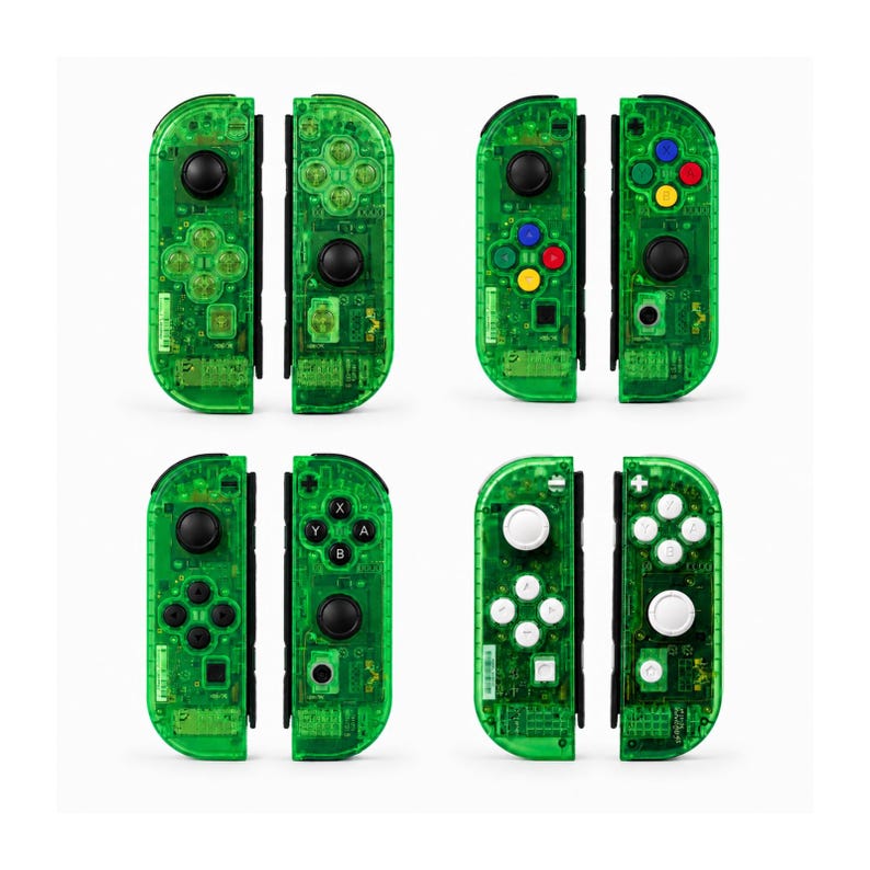 May include: A set of six transparent green game controllers, each with black buttons and directional pads. The controllers are arranged in pairs, showcasing different button layouts and designs. The clear casing reveals the internal components.