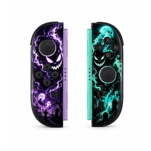 May include: A pair of game controllers featuring a spooky graveyard theme. The left controller is purple with a glowing ghost and dark trees. The right controller is teal with a similar ghostly design, featuring buttons labeled A, B, X, and Y.