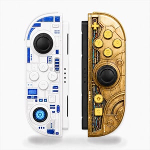 May include: Two game controllers featuring distinct designs. The left controller is white with blue geometric accents and a central circular blue light. The right controller is metallic gold with intricate mechanical circuitry patterns and gold buttons.