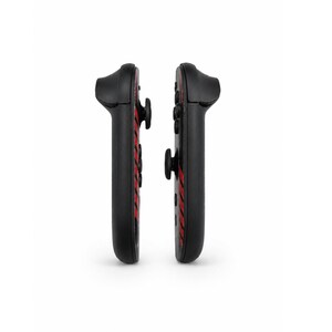May include: Two black video game controllers positioned side by side, each featuring a series of diagonal red stripes along the side panel, black buttons, and a black joystick, presented against a plain white background.