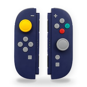 May include: A pair of dark blue video game controllers featuring a yellow analog stick, grey directional buttons, and a grey analog stick. The right controller includes a plus button, a home button, a C button, and four action buttons labeled A, B, X, and Y.