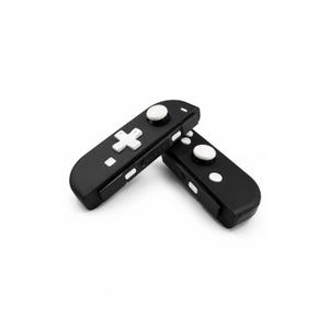 May include: Two black wireless video game controllers featuring white buttons, a white directional pad, and white analog sticks. The controllers have a smooth matte finish with small white circular buttons and side-mounted buttons for gaming input.