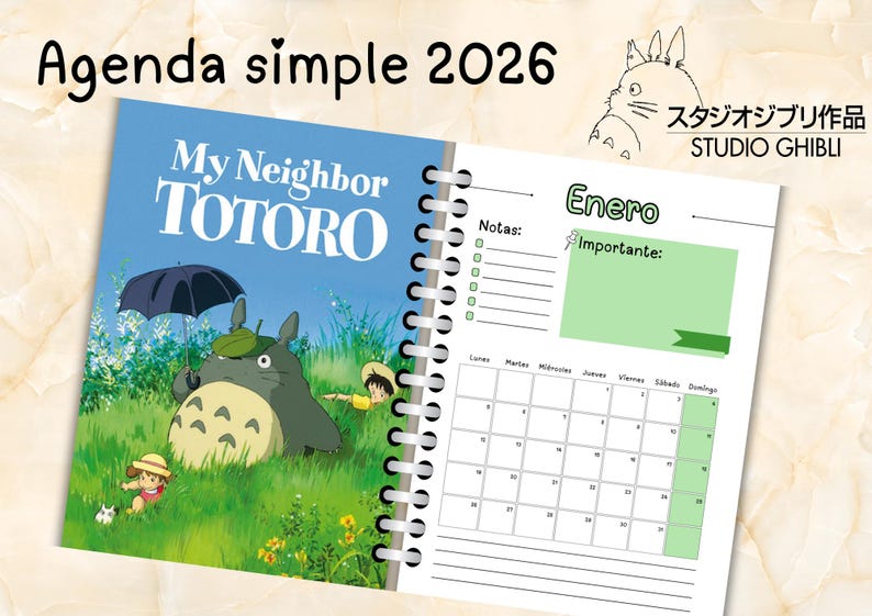 May include: A spiral-bound 2026 agenda featuring artwork from "My Neighbor Totoro." The cover displays the title and a scene with Totoro under an umbrella. The right page shows a calendar for January with space for notes.