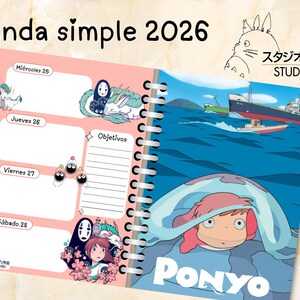 May include: Open planner with a pink and white design, featuring illustrations from Studio Ghibli's "Ponyo" and other characters. The planner includes weekly layouts, the text "Agenda simple 2026", and Japanese text.