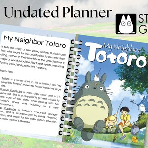 May include: A spiral bound planner featuring a colourful image of Totoro, a character from the Studio Ghibli film "My Neighbor Totoro". The planner is titled "My Neighbor Totoro" and includes a description of the characters from the film.