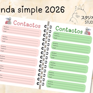 May include: Open notebook with contact pages. The title "Agenda simple 2026" is at the top. The notebook has pink and green contact sections with the word "Contactos" above each. A Studio Ghibli character is in the corner.