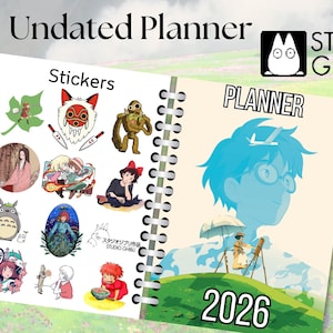 May include: An undated planner featuring a Studio Ghibli theme. The cover depicts a blue and white illustration of a young person wearing glasses. The planner has a spiral binding and a section for stickers. The stickers include characters from Studio Ghibli films, such as Totoro, No Face, and Kiki.