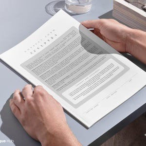 May include: A white document with the title "Consent Form Sculptra" printed on it. The document contains information about the Sculptra treatment. The document is being held by a person's hands.
