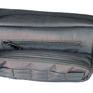 May include: A rectangular, black nylon bag with multiple zipped compartments. The bag has a textured surface and a small pocket on the front. The zips are black. The bag is designed for carrying small items.