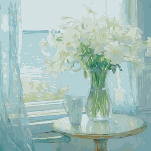 May include: A white vase filled with white flowers sits on a round wooden table with a white tablecloth. The table is next to a window with a view of the ocean.