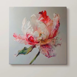 May include: Square canvas art depicting a close-up of a peony flower. The flower has white, pink, and red petals with a green stem and leaf. The painting has a textured, impasto style, with visible brushstrokes. The background is a soft, light grey.