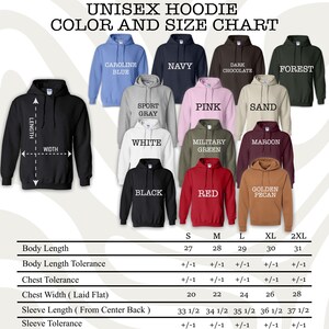 May include: A color and size chart for unisex hoodies. The image displays a black hoodie with measurement labels and examples of various hoodie colors, including black, red, and navy. The chart provides measurements for body length, chest width, and sleeve length.