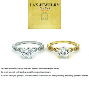 May include: Two silver and gold rings with a clear cubic zirconia stone. The rings have a twisted band design. The text "925" is visible on the rings.