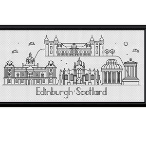May include: Black and white line art illustration of the Edinburgh skyline, featuring iconic buildings like Edinburgh Castle, the Palace of Holyroodhouse, and the Scottish Parliament. The text "Edinburgh: Scotland" is below the skyline.