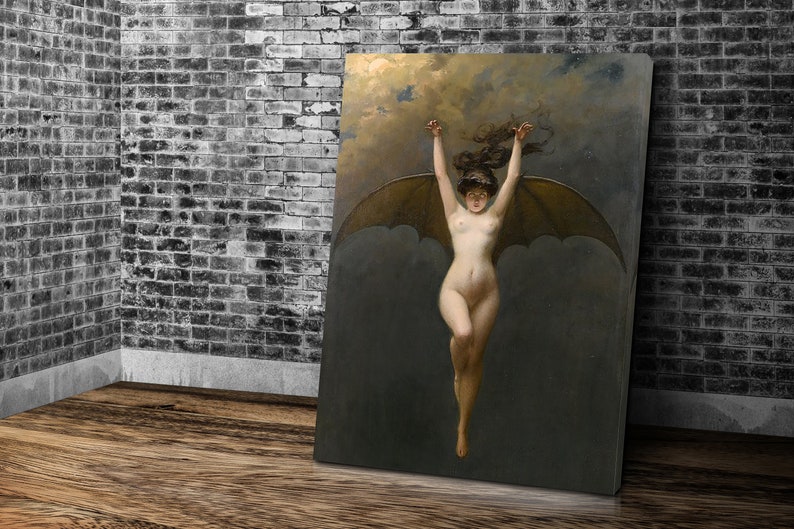 May include: A canvas print of a classical painting depicting a nude figure with bat-like wings, arms raised. The artwork features a dark, cloudy background with a hint of light. The print is displayed against a brick wall and wooden floor.