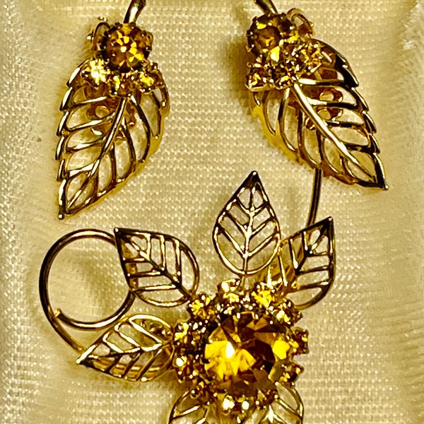 Vintage Goldtone Brooch and Clip-On Earring Set, embellished with Topaz Colored Rhinestones.