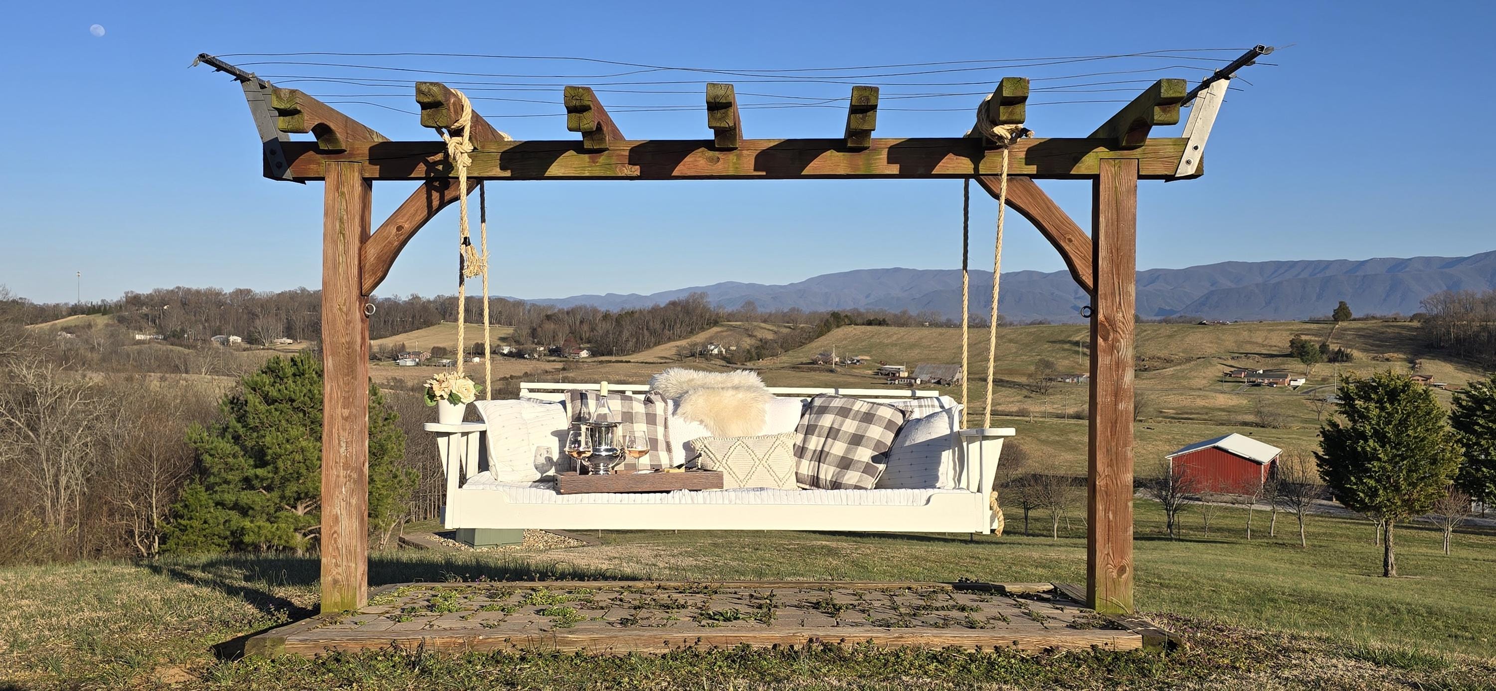Swinging Bed for porches, patios, and arbors.  In stock and made to order, heavy duty and built to last for years. Made in America.