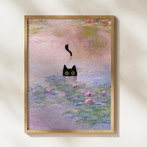 May include: A black cat with yellow eyes peeks out of a painting of water lilies. The painting is in a light wood frame.