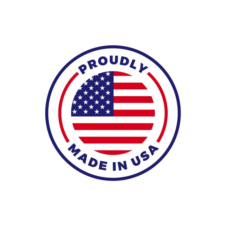 May include: Circular emblem featuring the American flag with red and white stripes and white stars on a blue background. The text "PROUDLY MADE IN USA" is in a blue font, encircling the flag.