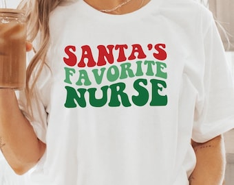 Sudadera de enfermera favorita de Papá Noel, camiseta de enfermera navideña, camisetas de enfermera navideñas, regalo de vacaciones de Navidad, linda sudadera con capucha de Papá Noel, camiseta retro de Papá Noel
