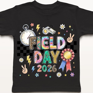 May include: Black t-shirt featuring a colourful "FIELD DAY 2026" graphic. The design includes a stopwatch, whistle, peace signs, flowers, and a ribbon. The letters in "FIELD DAY" are tie-dye.