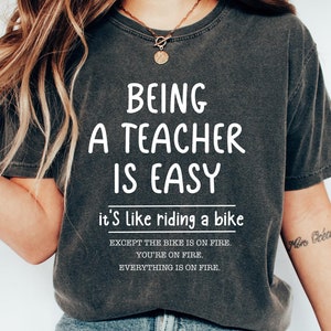 Being A Teacher is Easy It&#39;s Like Riding A Bike Shirt, Funny Teacher Meme T-shirt, Back to School Teacher Tee, Cute Teacher Outfit Ideas