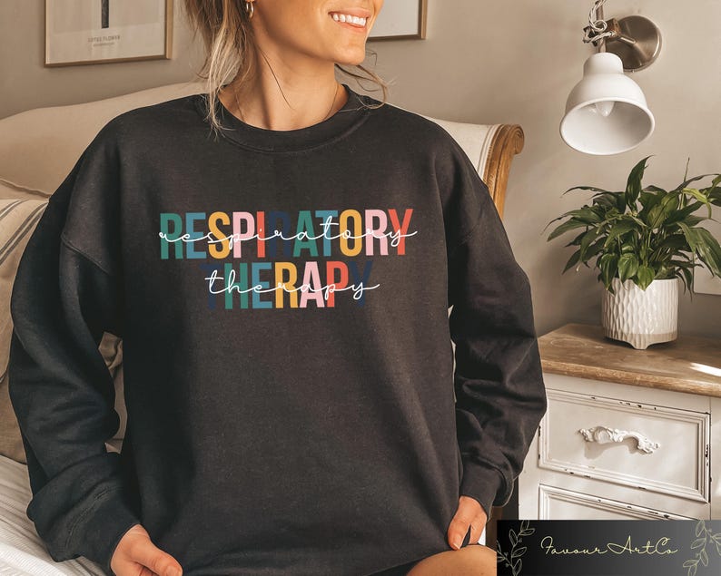 May include: Black sweatshirt with the text "RESPIRATORY THERAPY" in colorful letters.
