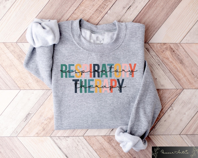 May include: Gray sweatshirt with the text "RESPIRATORY THERAPY" in colorful letters.