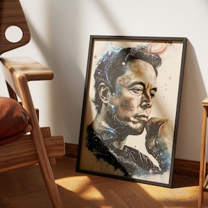 Op de afbeelding: Een ingelijste print van een portret van Elon Musk met een galaxie achtergrond. Het portret is in een zwarte lijst en de achtergrond is een mix van blauw, wit en zwart.