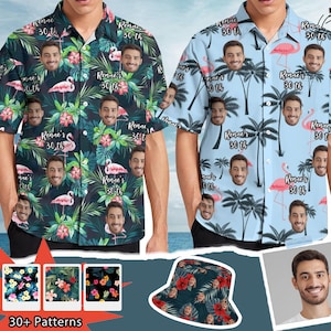 May include: Two short-sleeved button-down shirts with tropical patterns. One shirt is dark with pink flamingos, flowers, and faces. The other is light blue with palm trees, flamingos, and faces. The image also shows a bucket hat with a similar pattern.