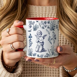 May include: A set of three ceramic mugs with a speckled, matte finish. The mugs are in shades of cream, light gray, and dark gray. Each mug has a simple, minimalist design, perfect for coffee or tea.