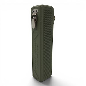 May include: An olive green rectangular storage case with a textured surface and diagonal grooves. The case features a silver metal latch closure at the top and embossed text on the side that reads "MILL CARRIER GRIP / 9MM / 40SW / 45ACP".