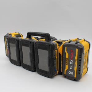 May include: A set of five yellow and black DeWalt batteries, including a 9.0 Ah FlexVolt battery, a 20V Max Power Stack battery, and three 20V Max batteries. The batteries are arranged in a carrying case with a black handle.