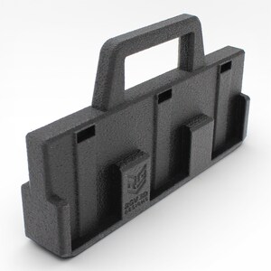 May include: A black 3D-printed carrying case with a handle and multiple slots. The case has a textured surface and the text "RGV3D DESIGNS" is visible on the side. The design appears to be for holding or organizing items.