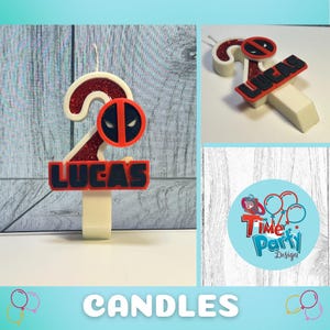 May include: Red and black personalized birthday candle with a number 2, the name "LUCAS" and a Deadpool logo. The candle is on a white base. The image also includes a logo for "Time Party Design".