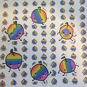 May include: A sheet of stickers featuring a rainbow fruit design. The fruit has a smiling face and is walking. The stickers are on a white background.