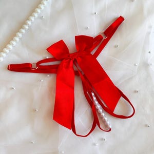 One-Size Red Bow Thong with Satin Ribbon and Pearl Accents – Playful & Elegant V-String Thong for Special Occasions