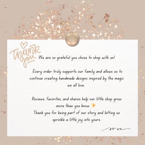 May include: A thank you card with a gold-colored push pin. The card has handwritten text that says "Thank you" and a message of gratitude to customers for supporting the shop and its handmade designs.