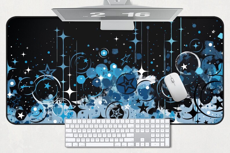May include: A black and blue mouse pad with a starry night design. The design features white stars, blue circles, and blue swirls. The mouse pad is rectangular and has a smooth surface.