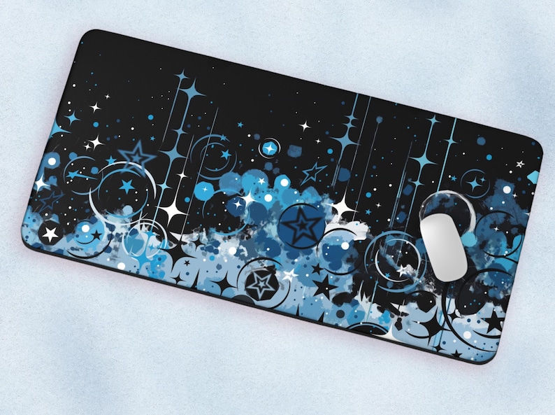 May include: A black phone case with a blue and white abstract design featuring stars, circles, and swirls.