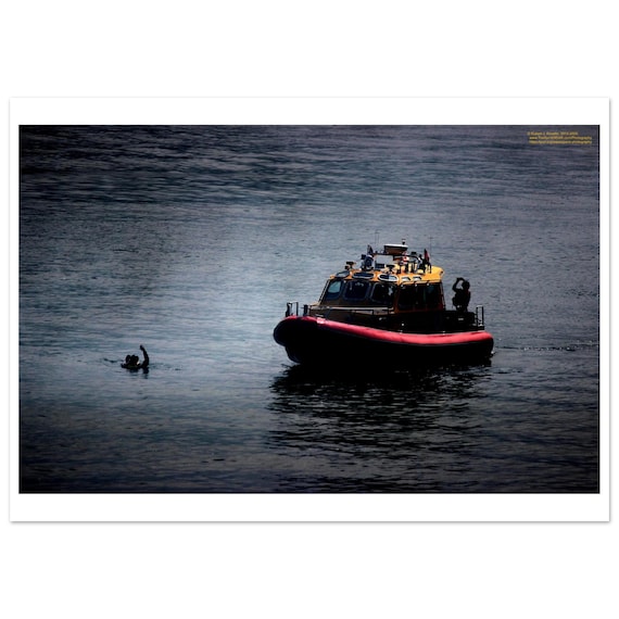 Rescue boat manoverboard - person in water - on Premium Semi-Glossy Paper Poster