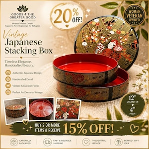 May include: Vintage Japanese stacking box set. The set includes a large round lid and two stacking boxes. The boxes are red inside with a black and gold floral design on the outside. The diameter is 12 inches, and the height is 4 inches.