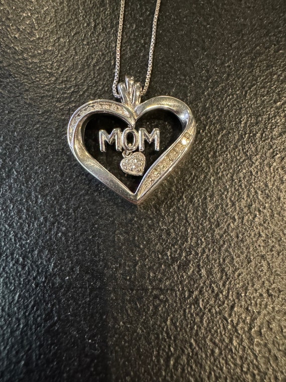 Beautiful sterling silver & diamond Mom necklace.